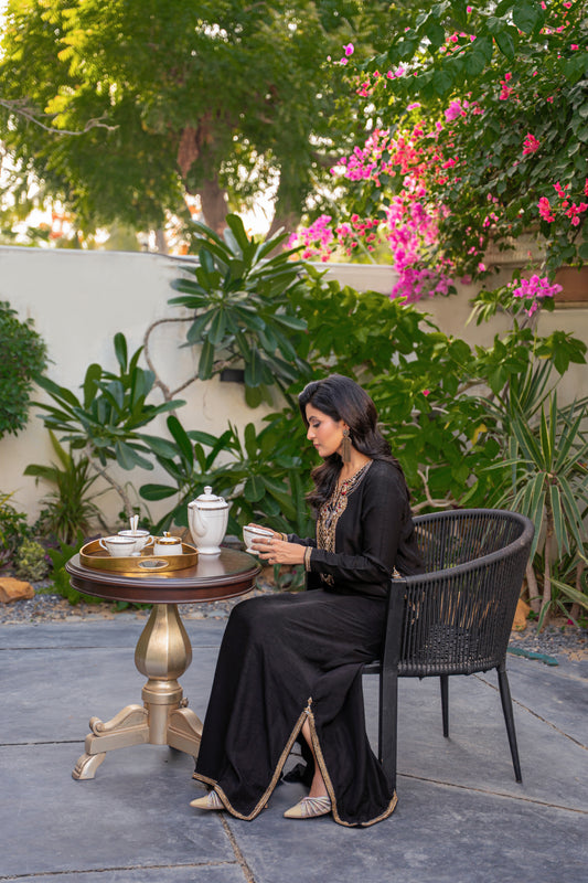 Shahnoor - black outfit sitting pose by Alishba Kashif