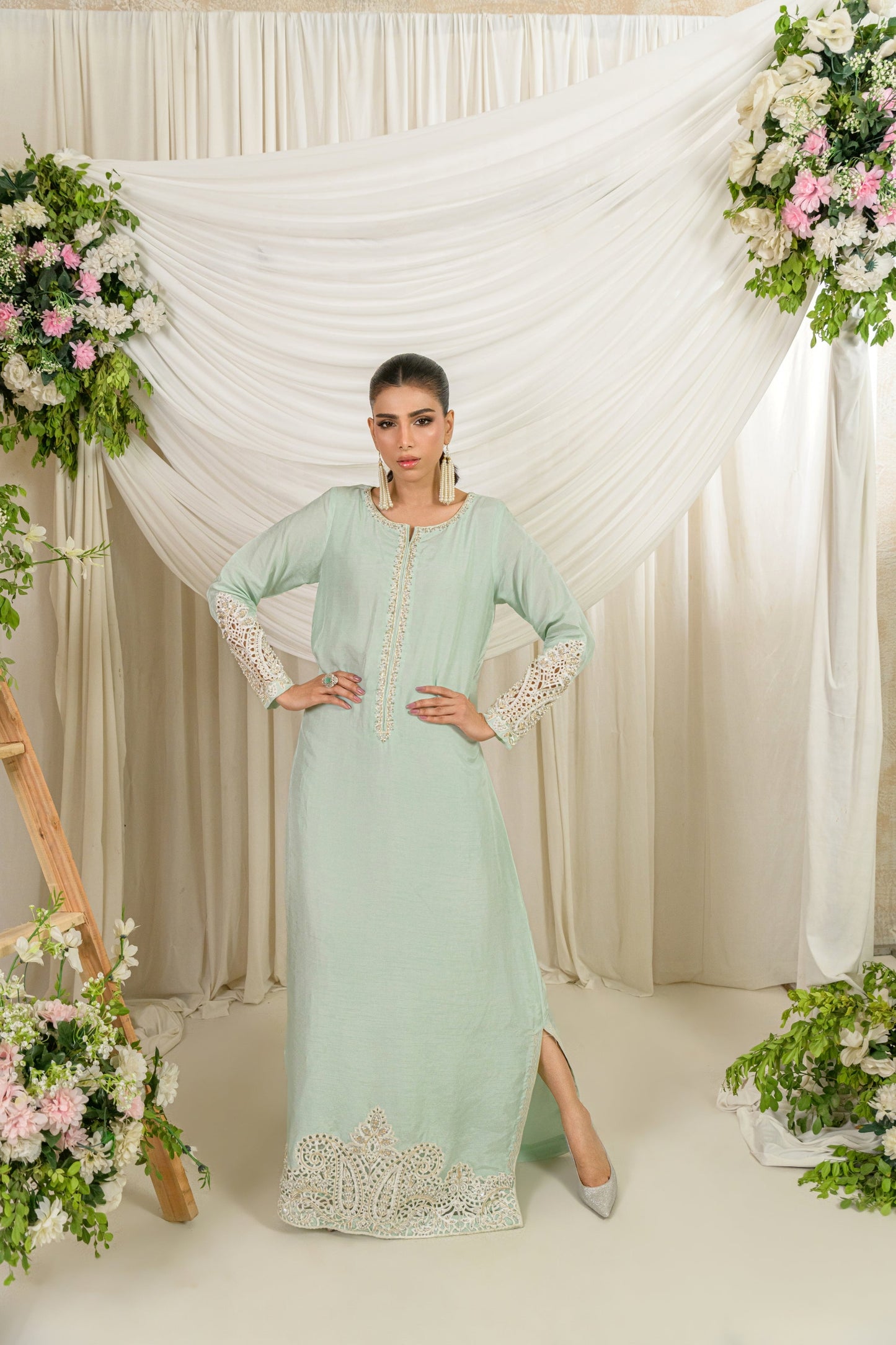 Mist - soft green silk kaftan with cutwork embellishments front pose by Alishba Kashif