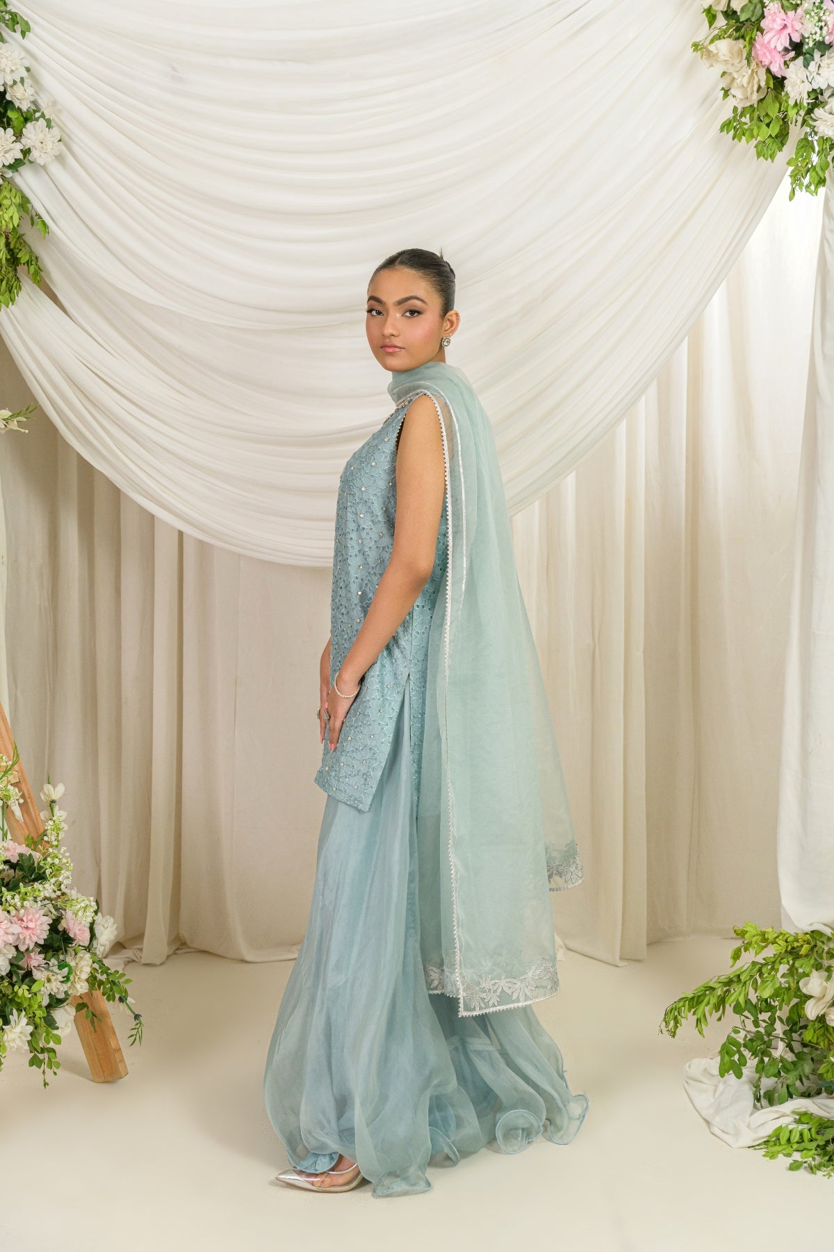 Frost Bloom - blue embroidered formal outfit side view by Alishba Kashif