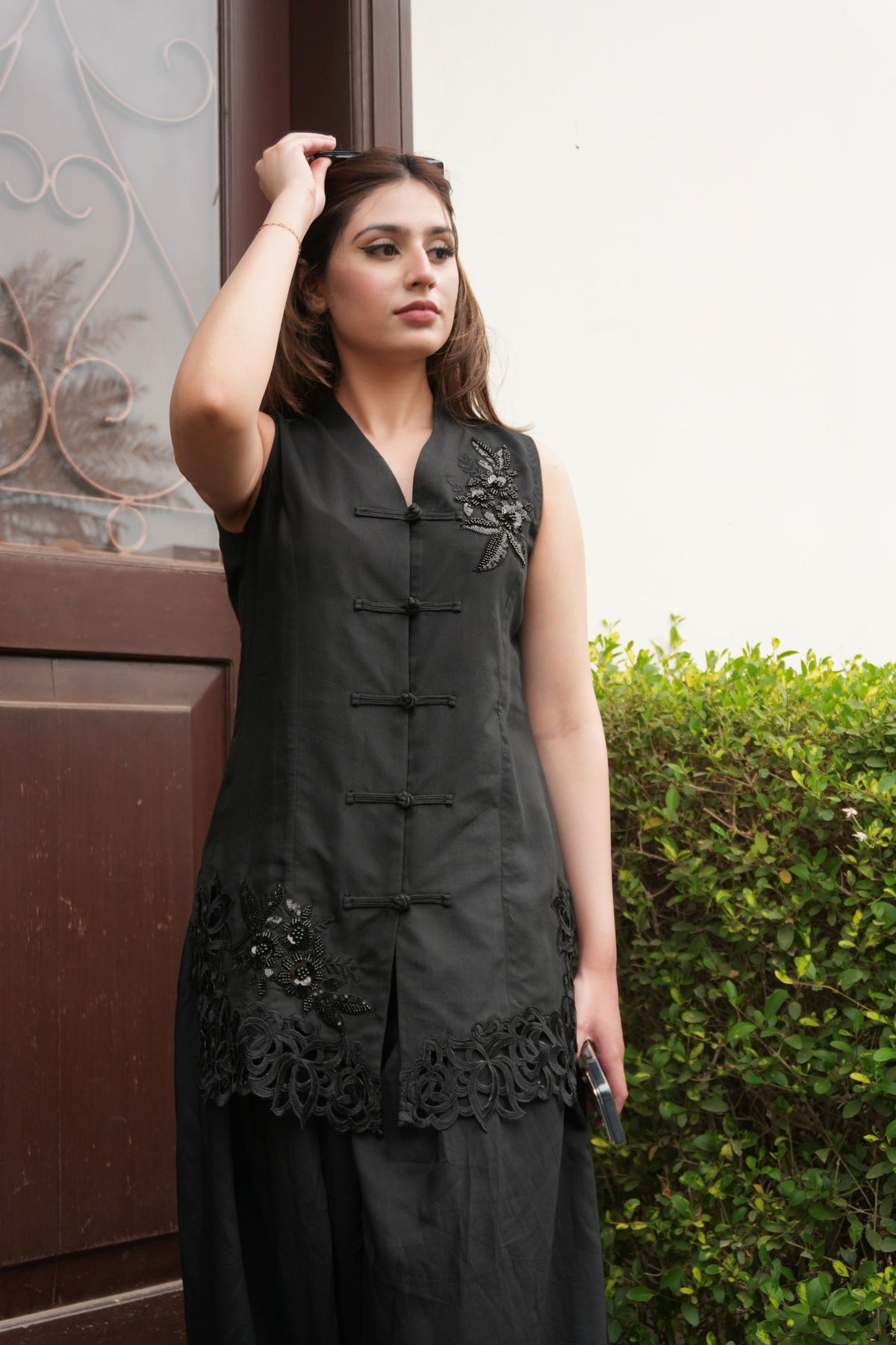 Alisho After Dark black sleeveless top with Chinese style buttons and lace trim