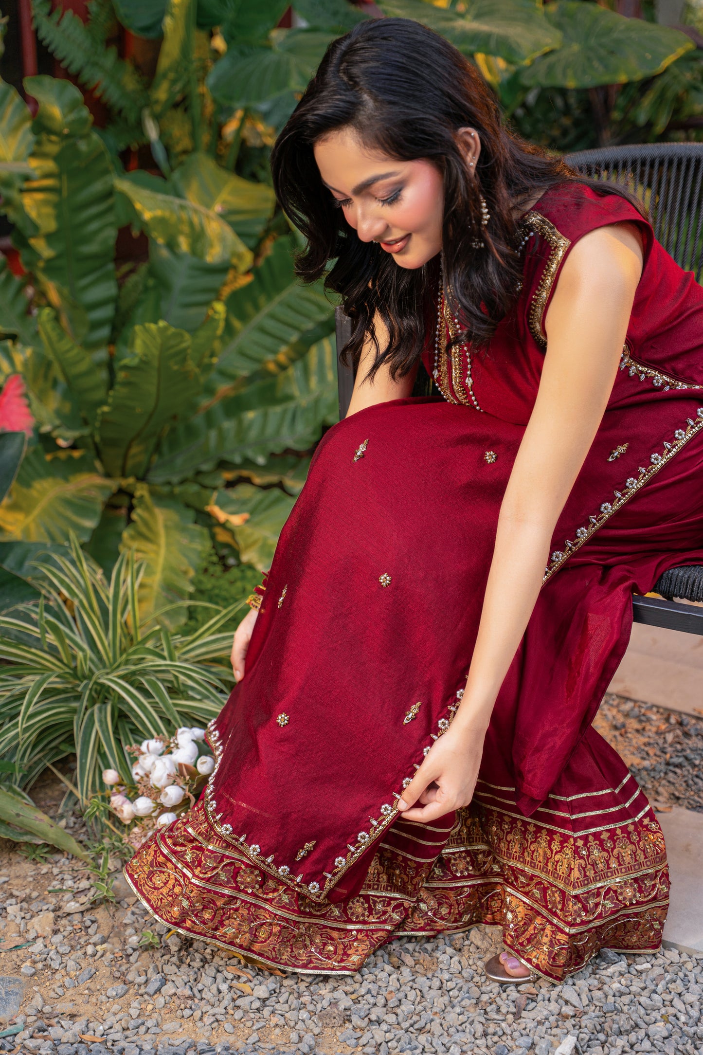 Rouge - deep red embroidered formal outfit sitting pose by Alishba Kashif