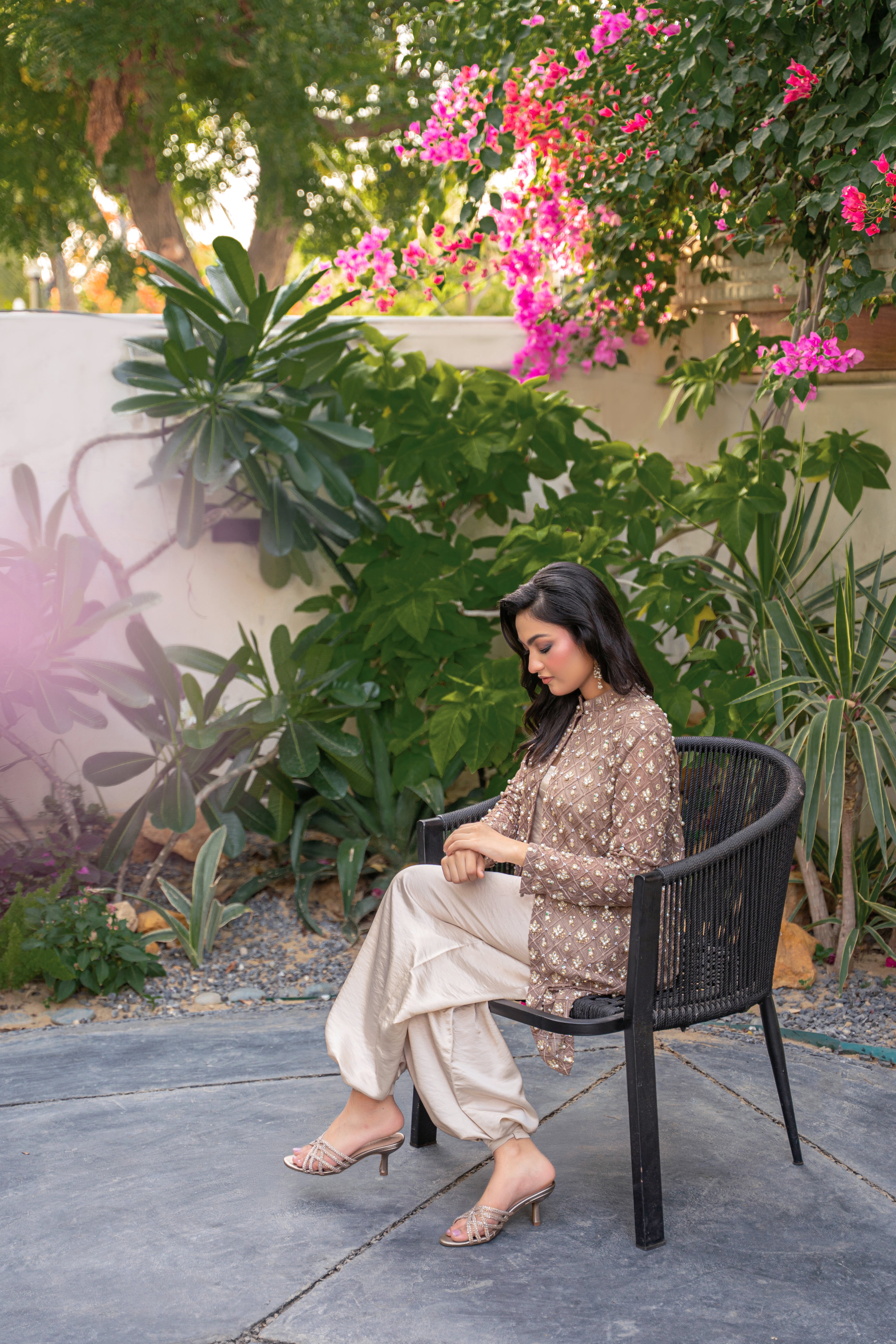 Taupe Éclat - brown embroidered formal outfit sitting pose by Alishba Kashif
