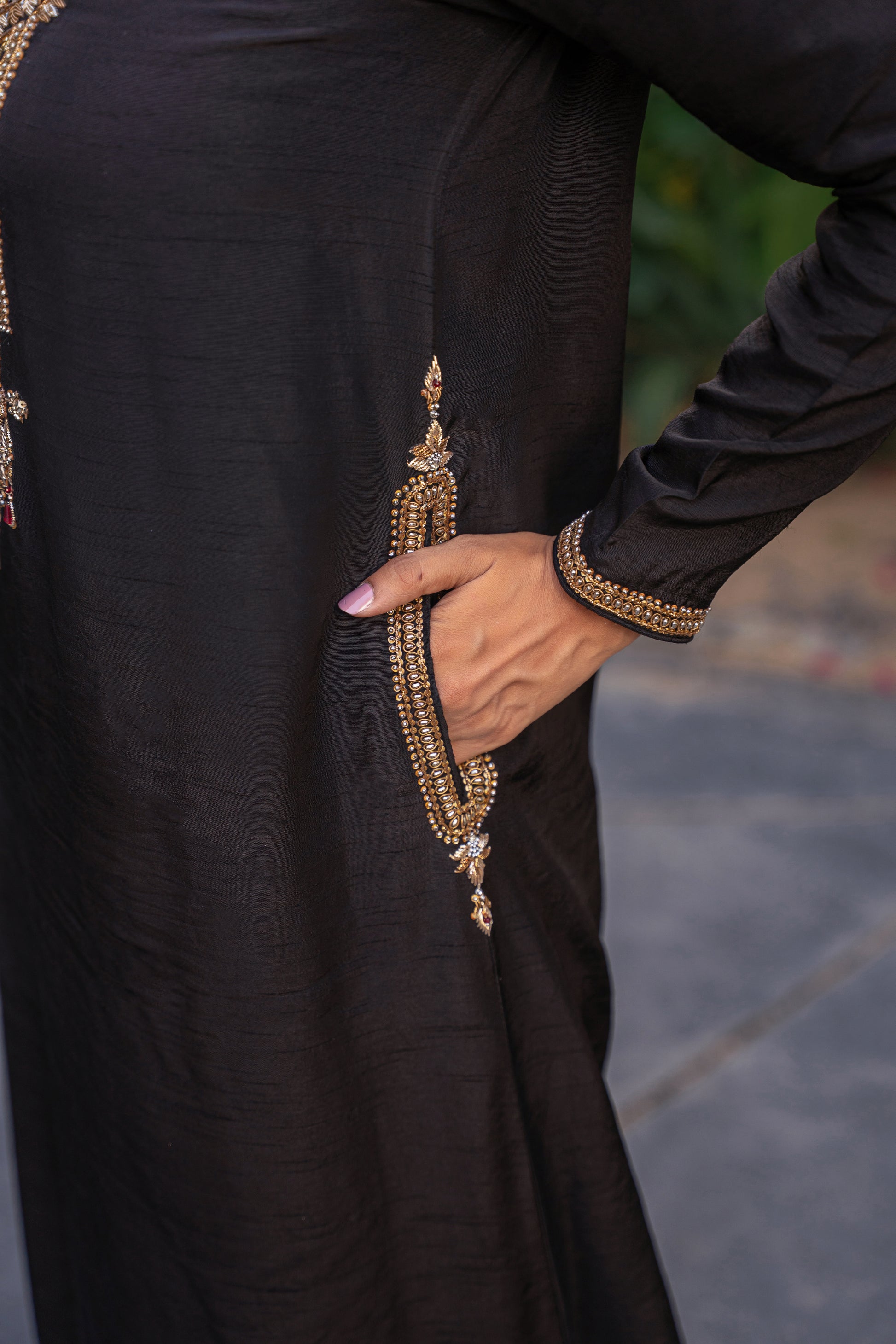 Shahnoor- black embroidered suit close up view by Alishba Kashif