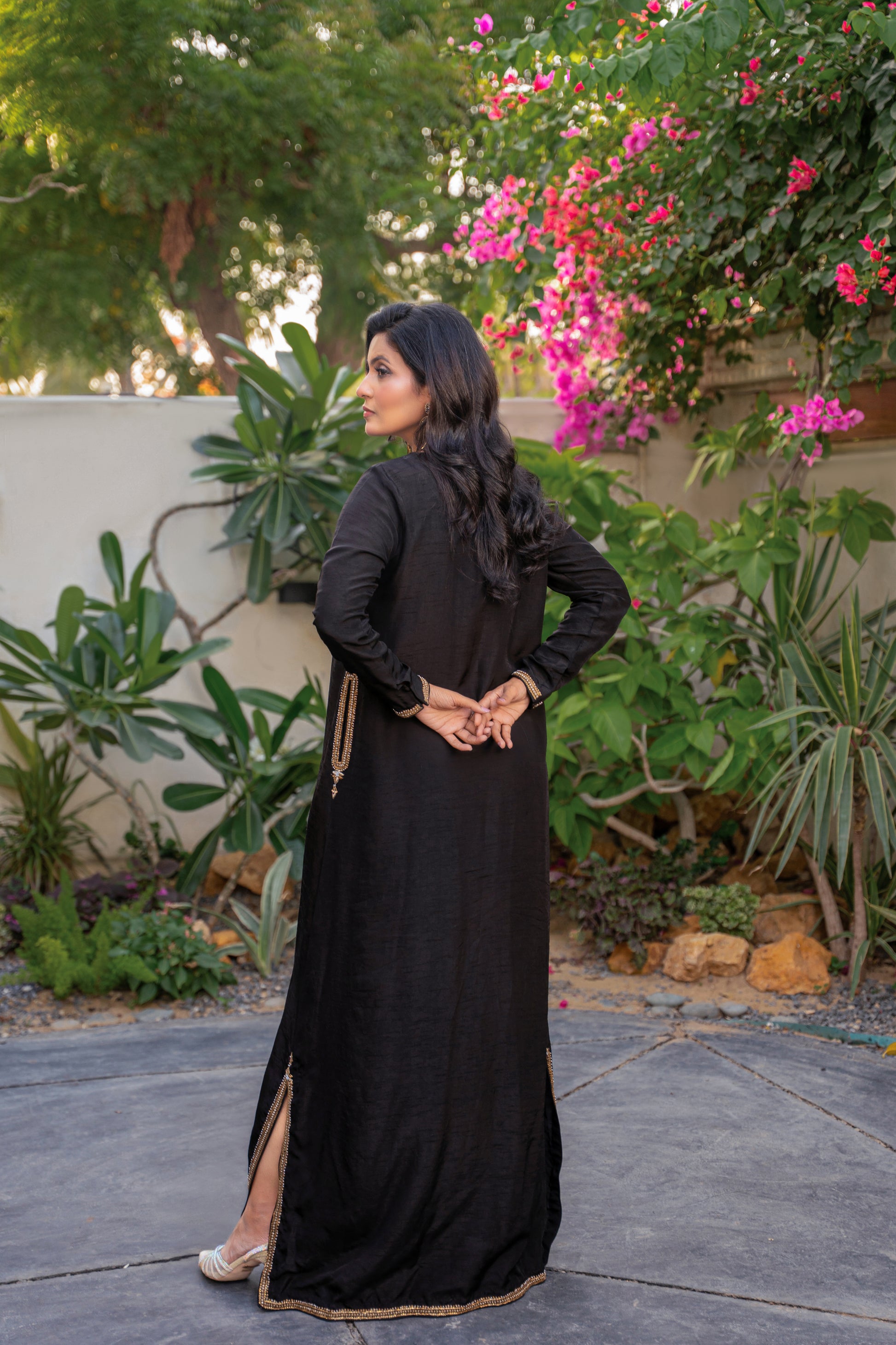 Shahnoor - black embroidered outfit back view by Alishba Kashif
