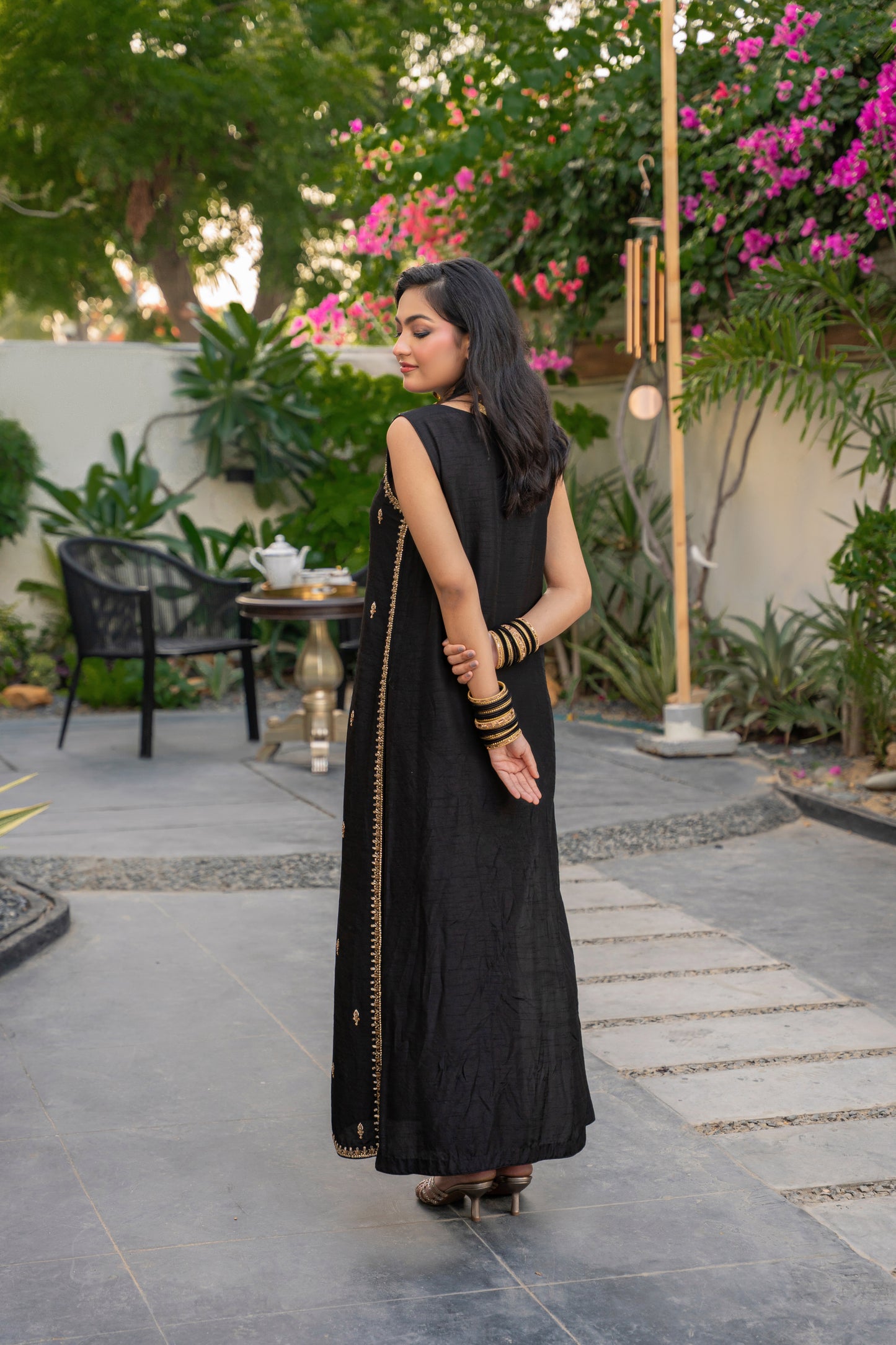 Zarnoor - black embroidered outfit back view by Alishba Kashif