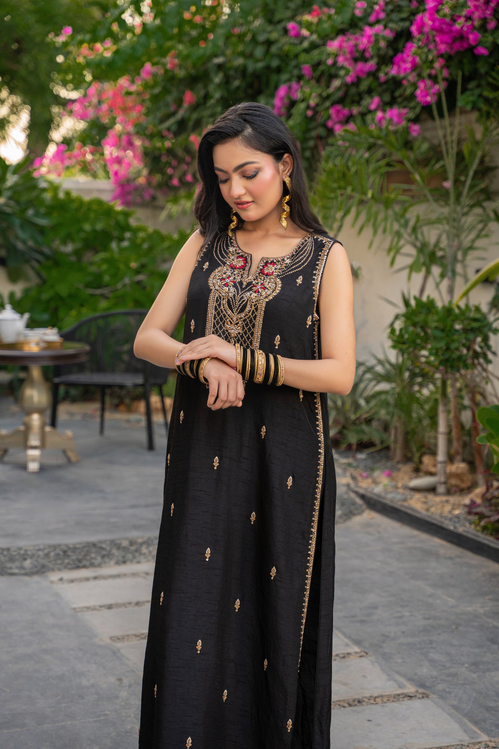 Zarnoor - black embroidered outfit side view by Alishba Kashif