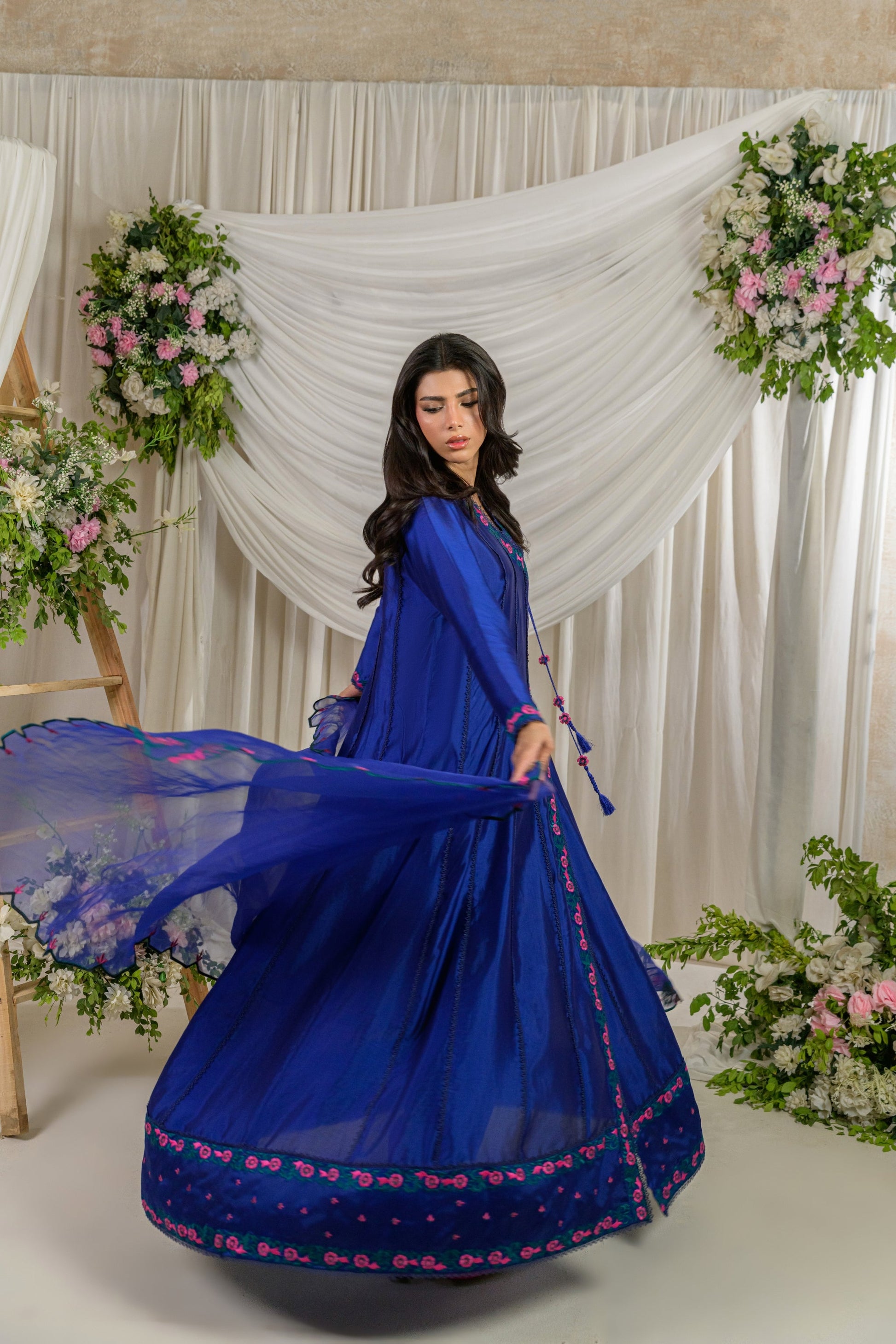 Meherbano - cobalt blue angrakha full length side view by Alishba Kashif