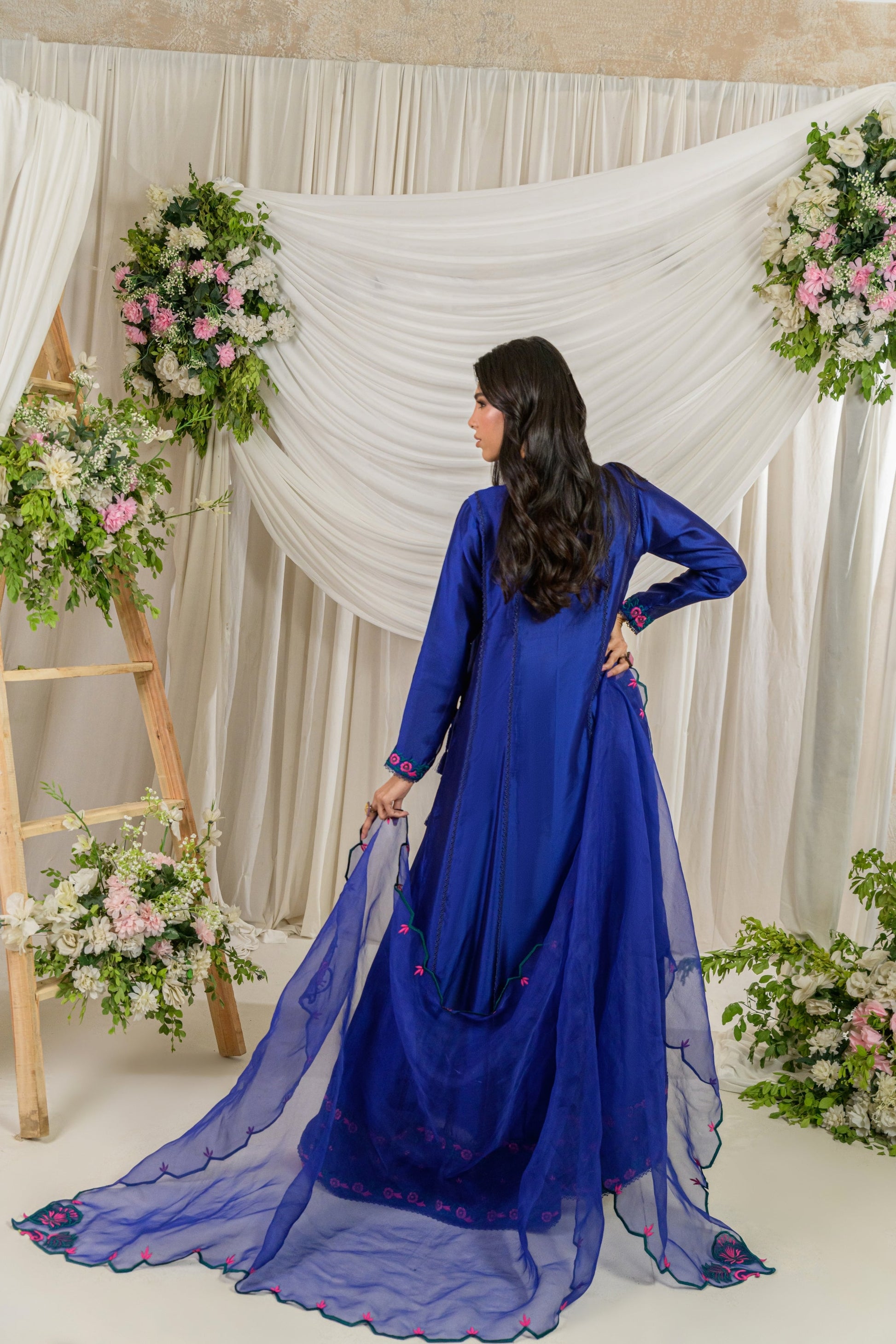 Meherbano - cobalt blue angrakha back view by Alishba Kashif