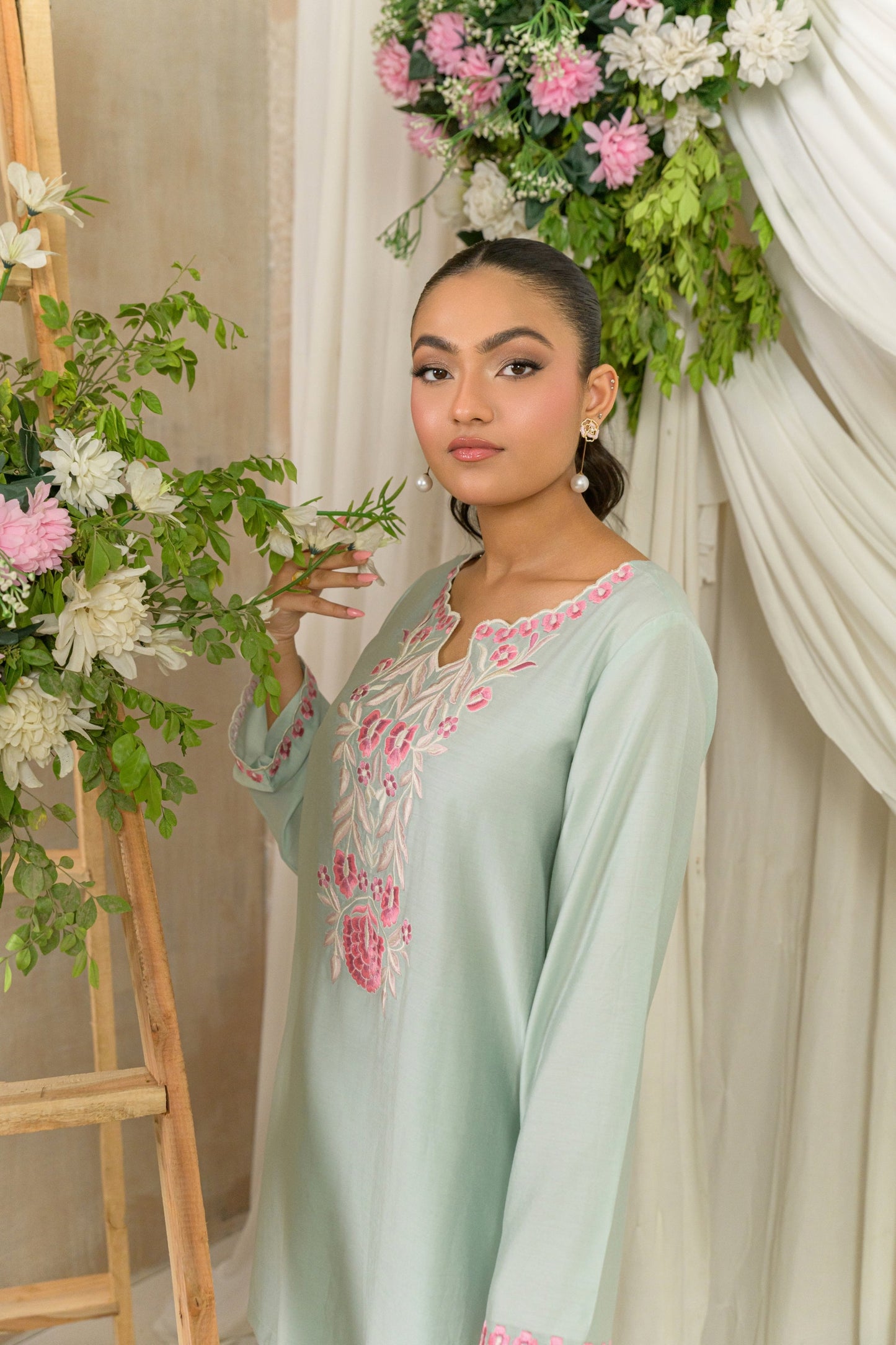 Saahil - mint silk cotton kurta with pink embroidery side view neckline detail by Alishba Kashif