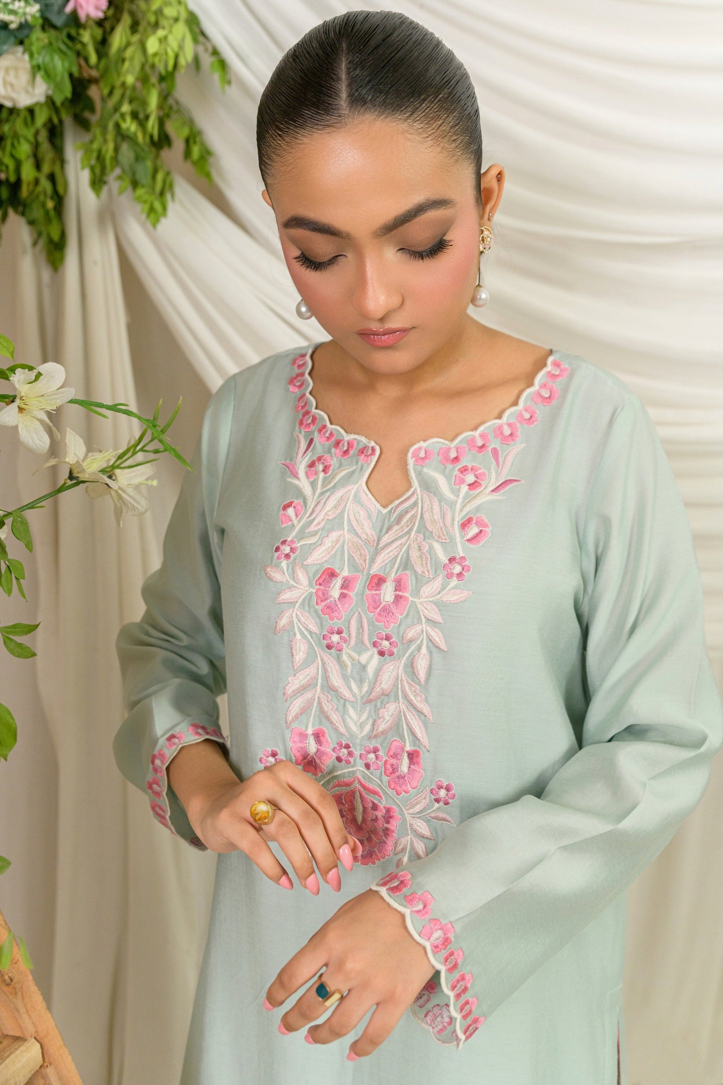 Saahil - mint silk cotton kurta with pink embroidery neckline detail view by Alishba Kashif