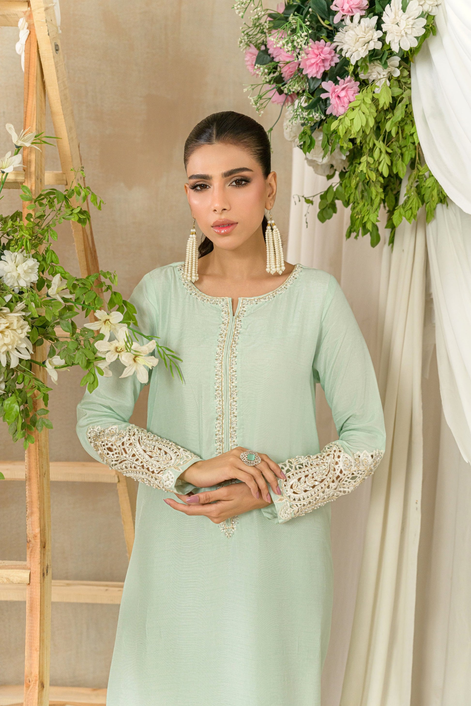 Mist - soft green silk kaftan with cutwork embellishments sleeve detail view by Alishba Kashif