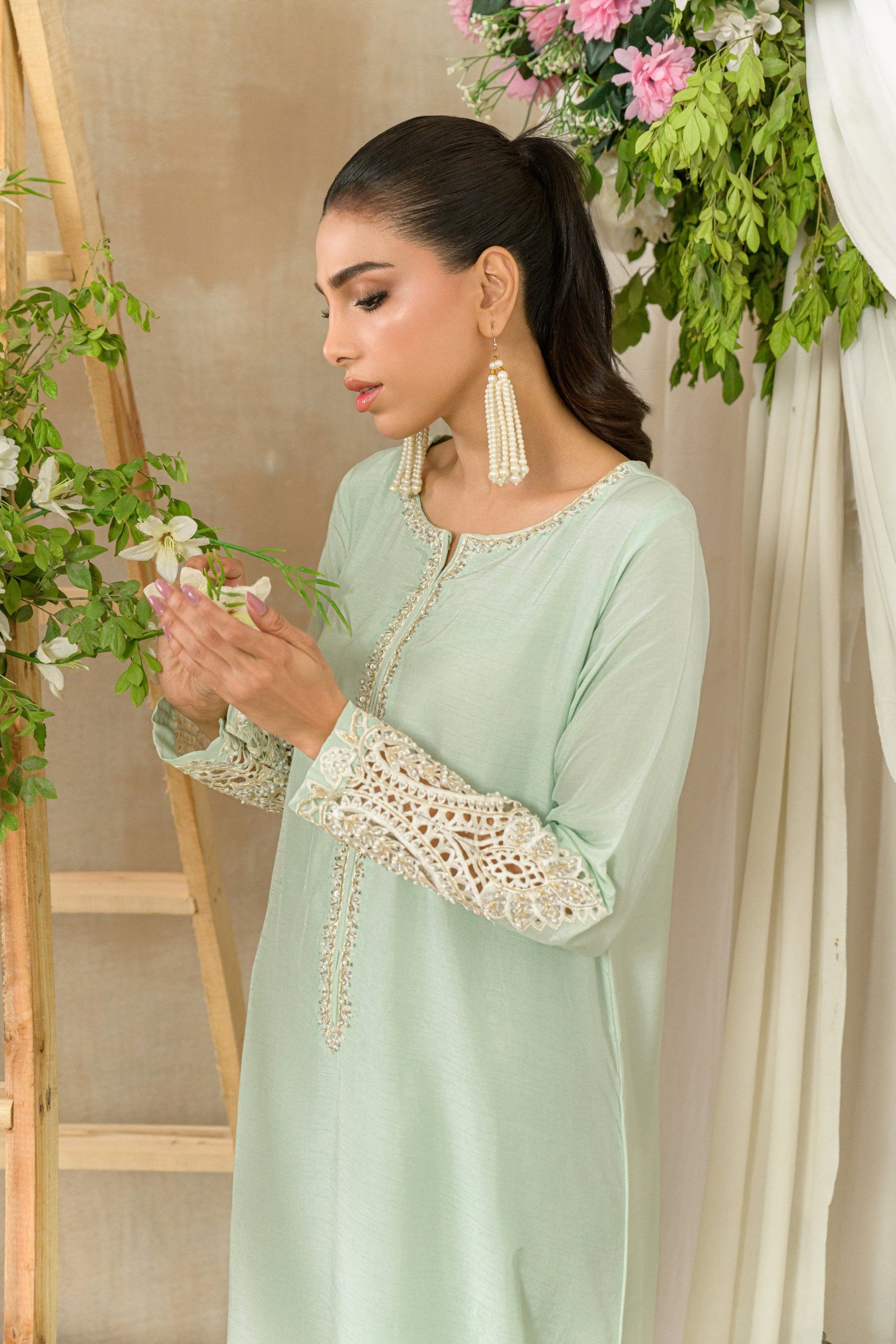 Mist - soft green silk kaftan with cutwork embellishments side sleeve detail view by Alishba Kashif