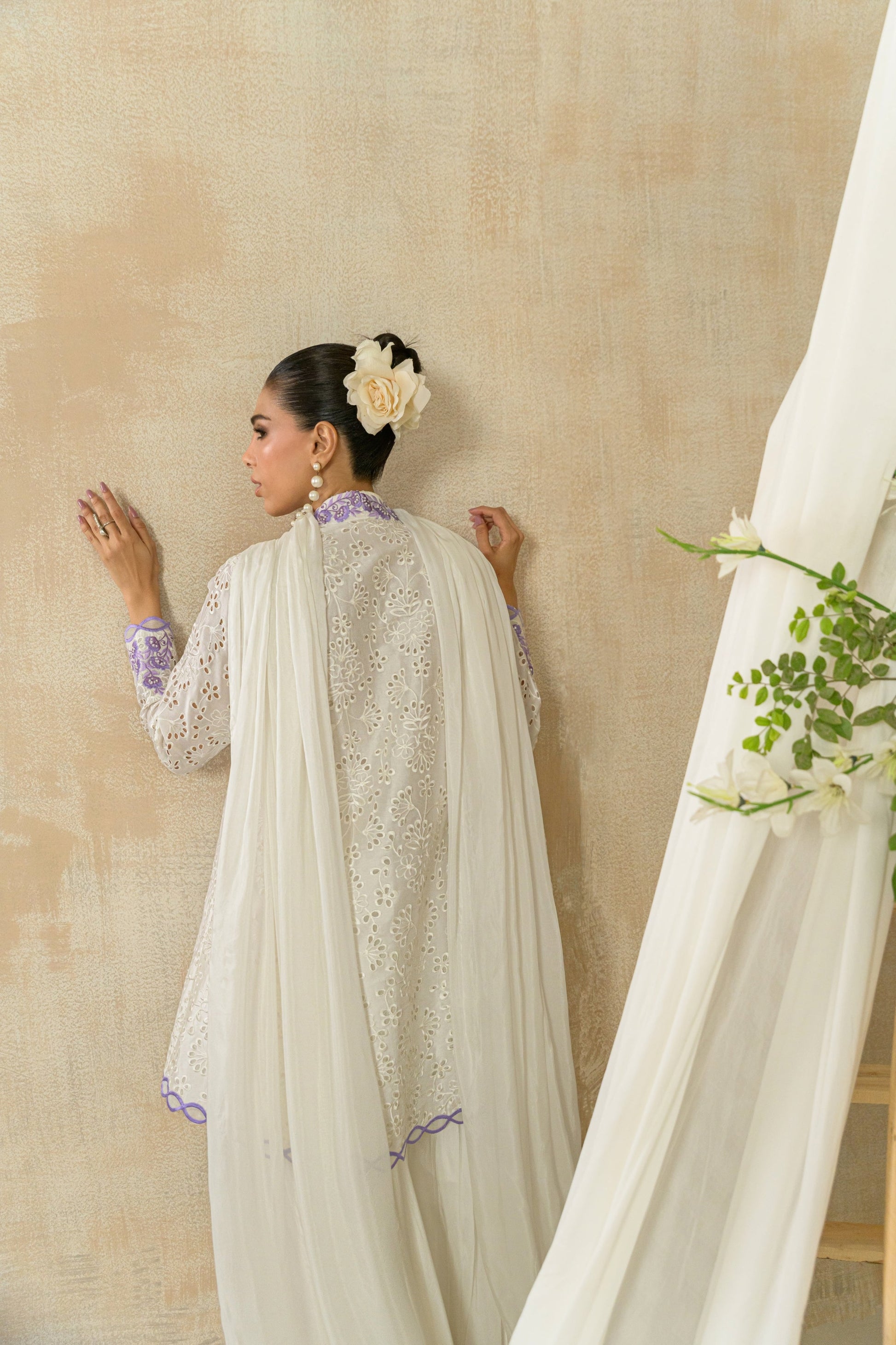Elan Blanc - white angrakha with purple embroidery back view by Alishba Kashif