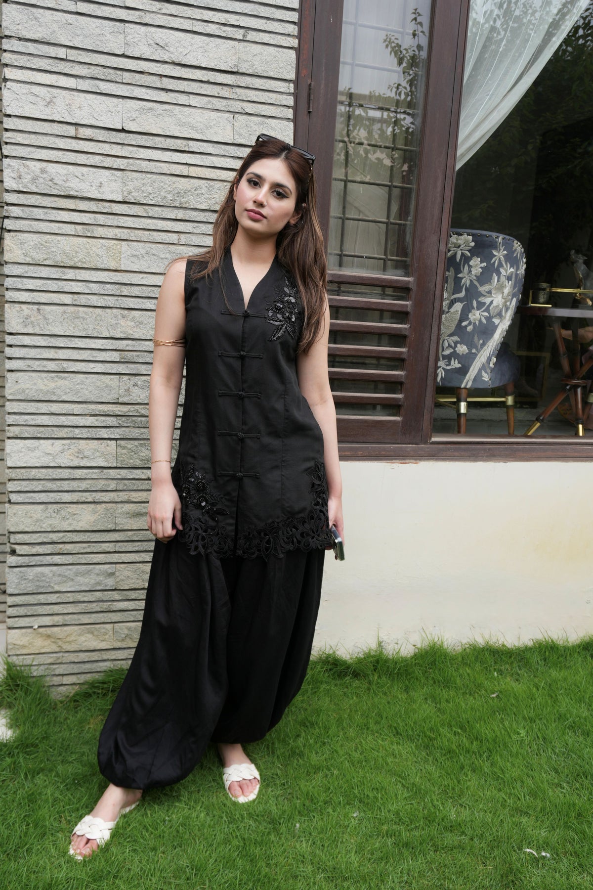 Alisho After Dark black halter sleeveless top with cutwork detailing and balloon pants