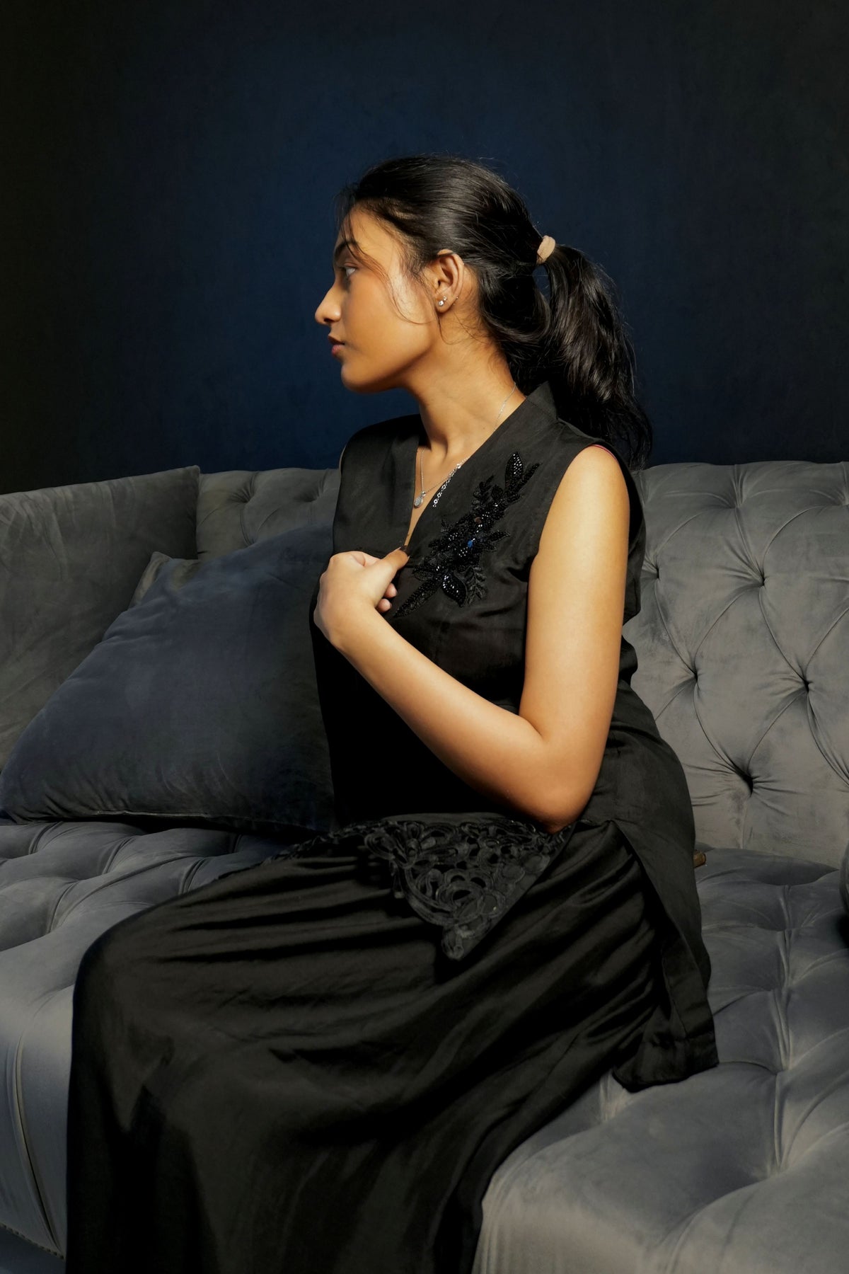 Alisho After Dark black sleeveless top with floral embellishment and lace detail