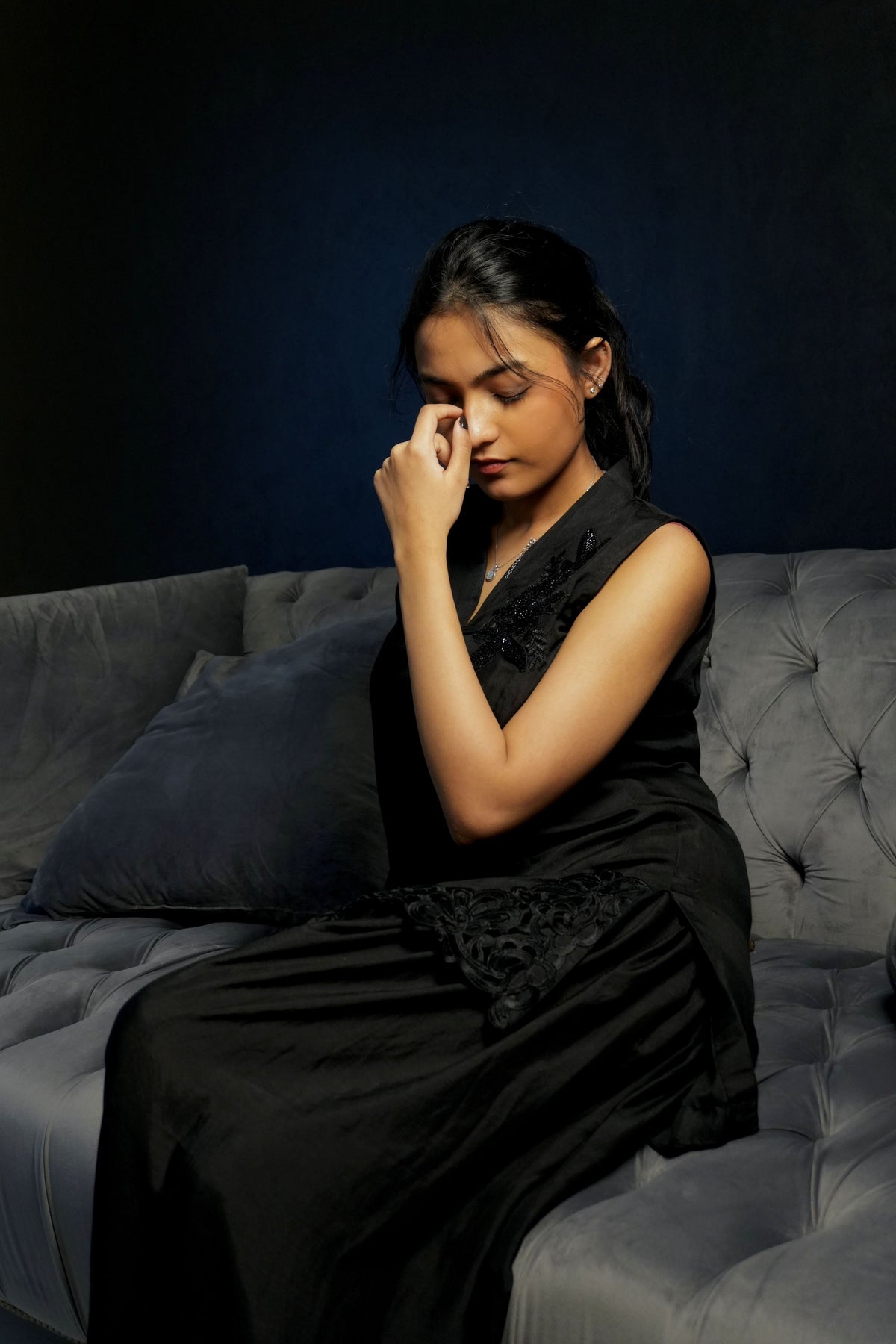 Alisho After Dark black sleeveless top with lace and floral embellishment