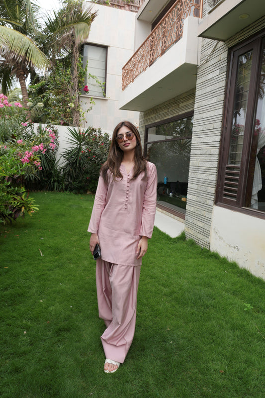 Alisho Blush Rush blush pink kurta and farshi shalwar set worn outdoors
