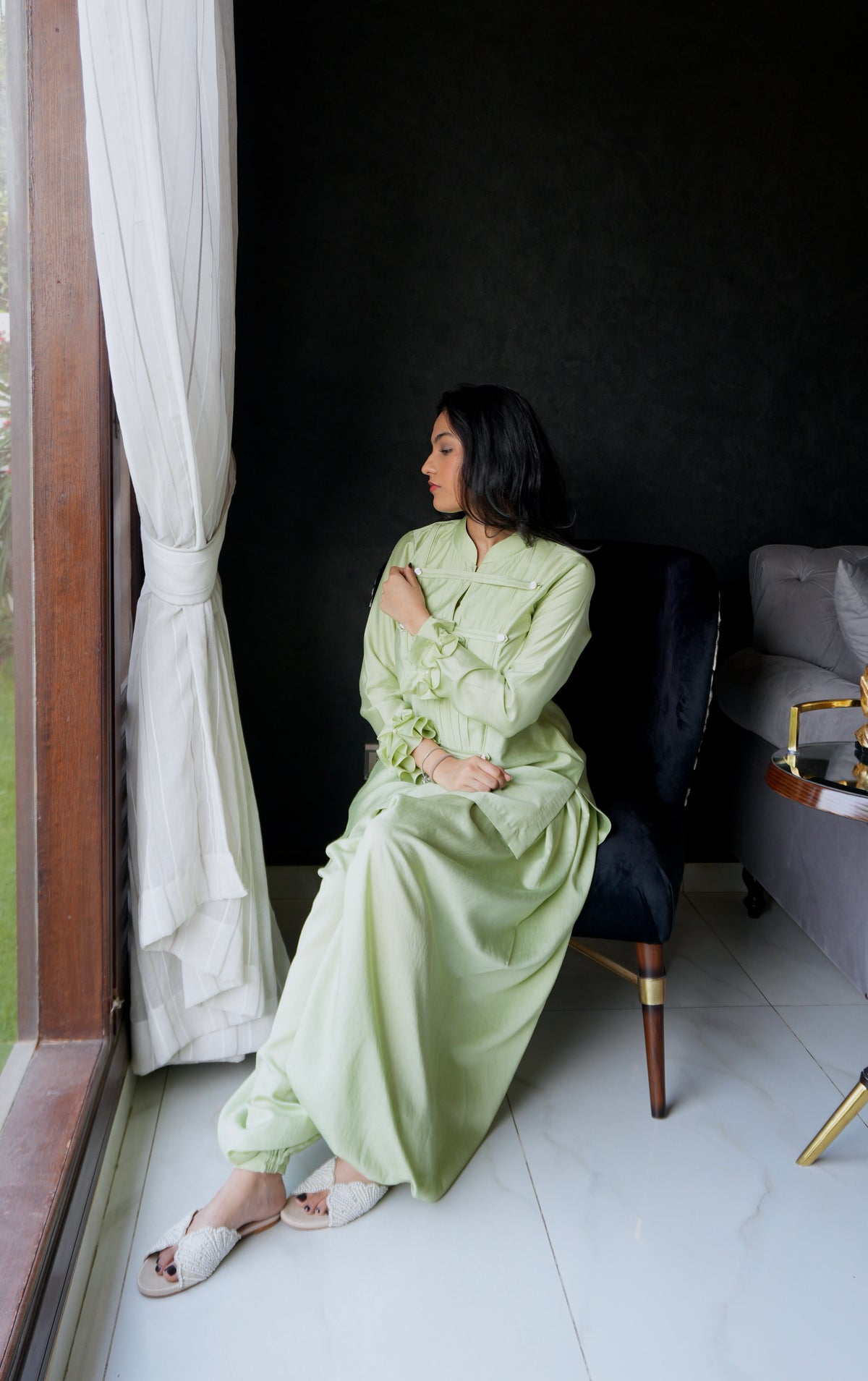 Alisho Matcha Mood matcha green Mandarin-collar top and balloon pants worn by a model indoors 