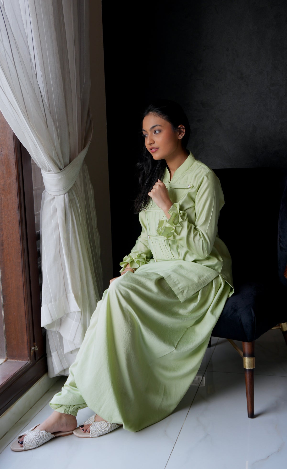 Alisho Matcha Mood matcha green Mandarin-collar top and balloon pants worn by a model indoors