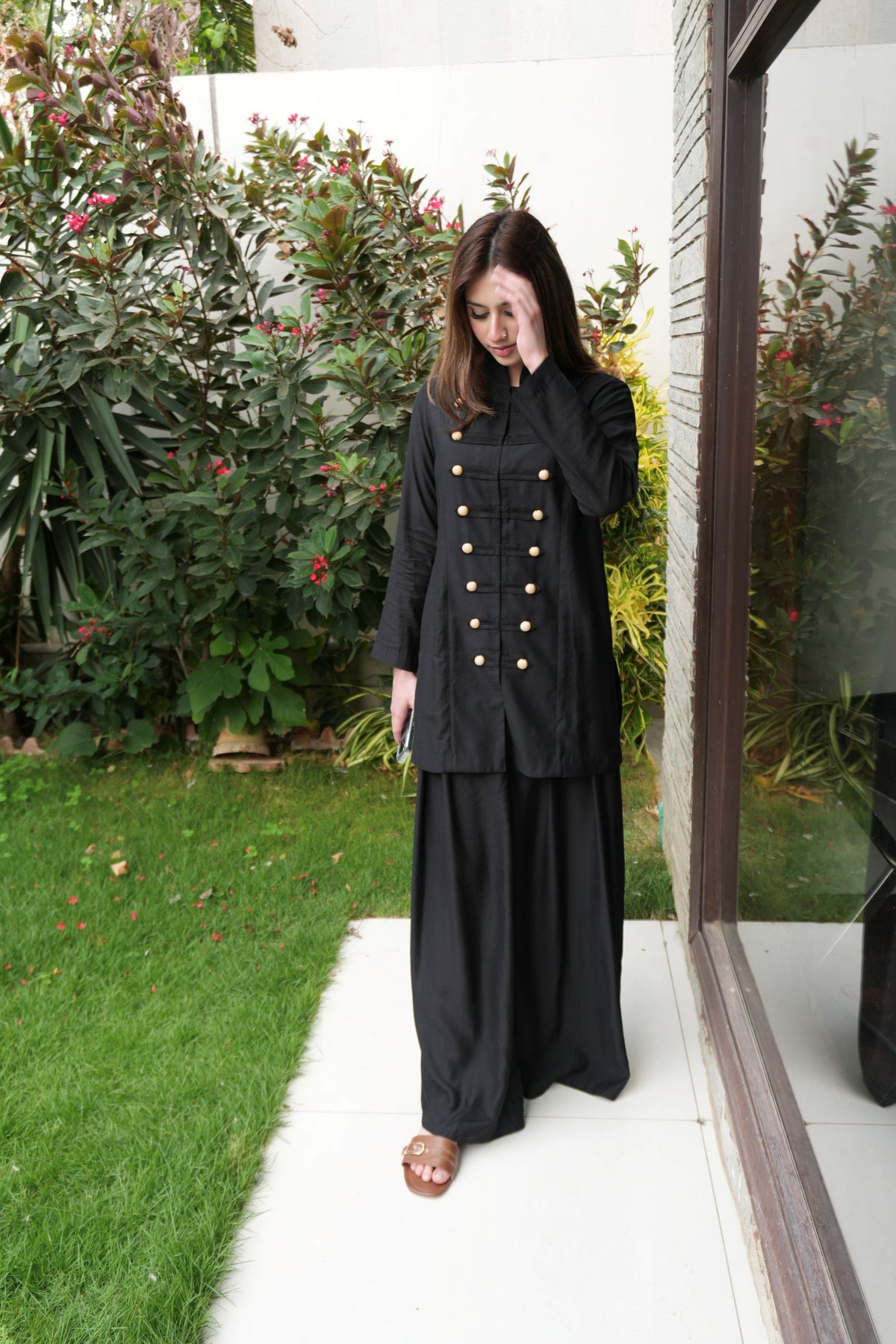 Alisho Power Play black Mandarin collar top with buttons detailing and wide leg pants full look outdoors
