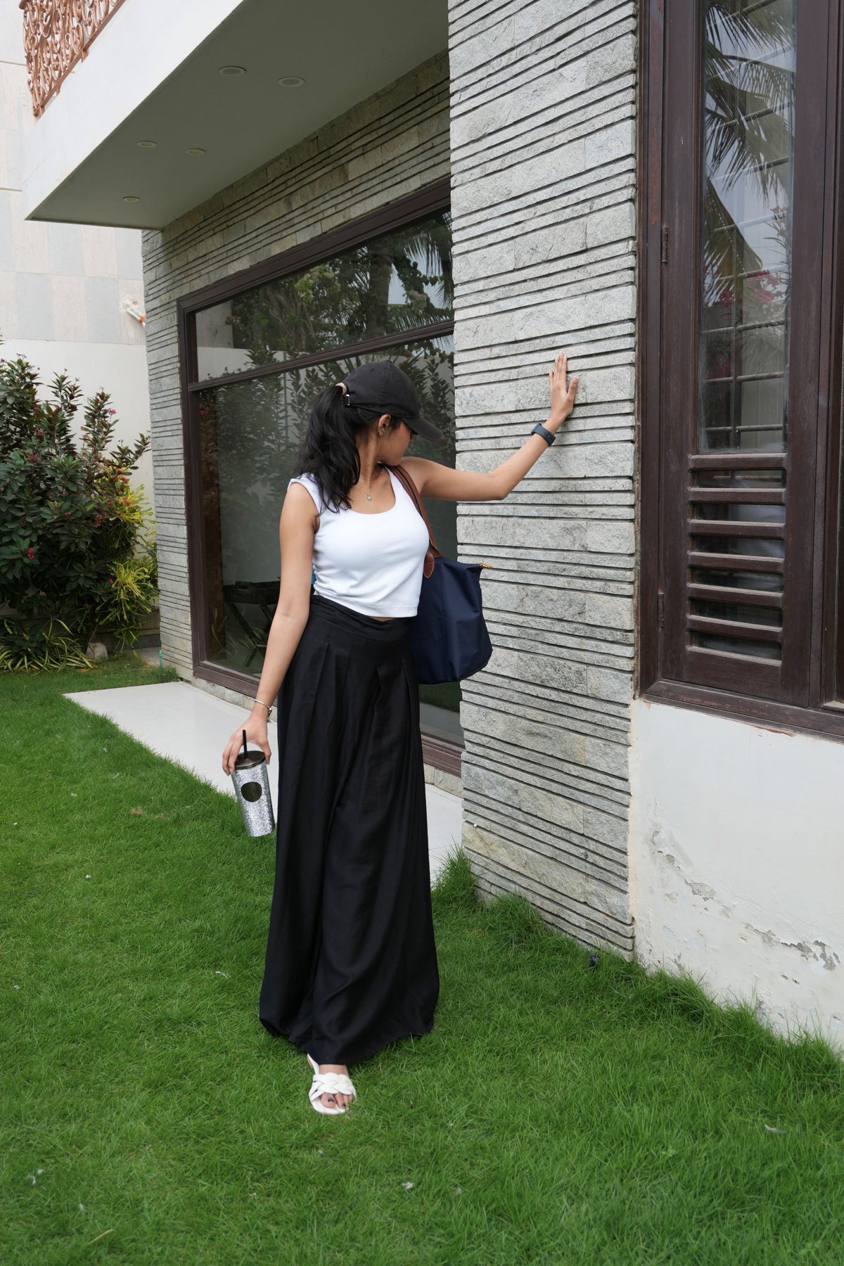Alisho Power Play black wide-leg pants worn by a model
