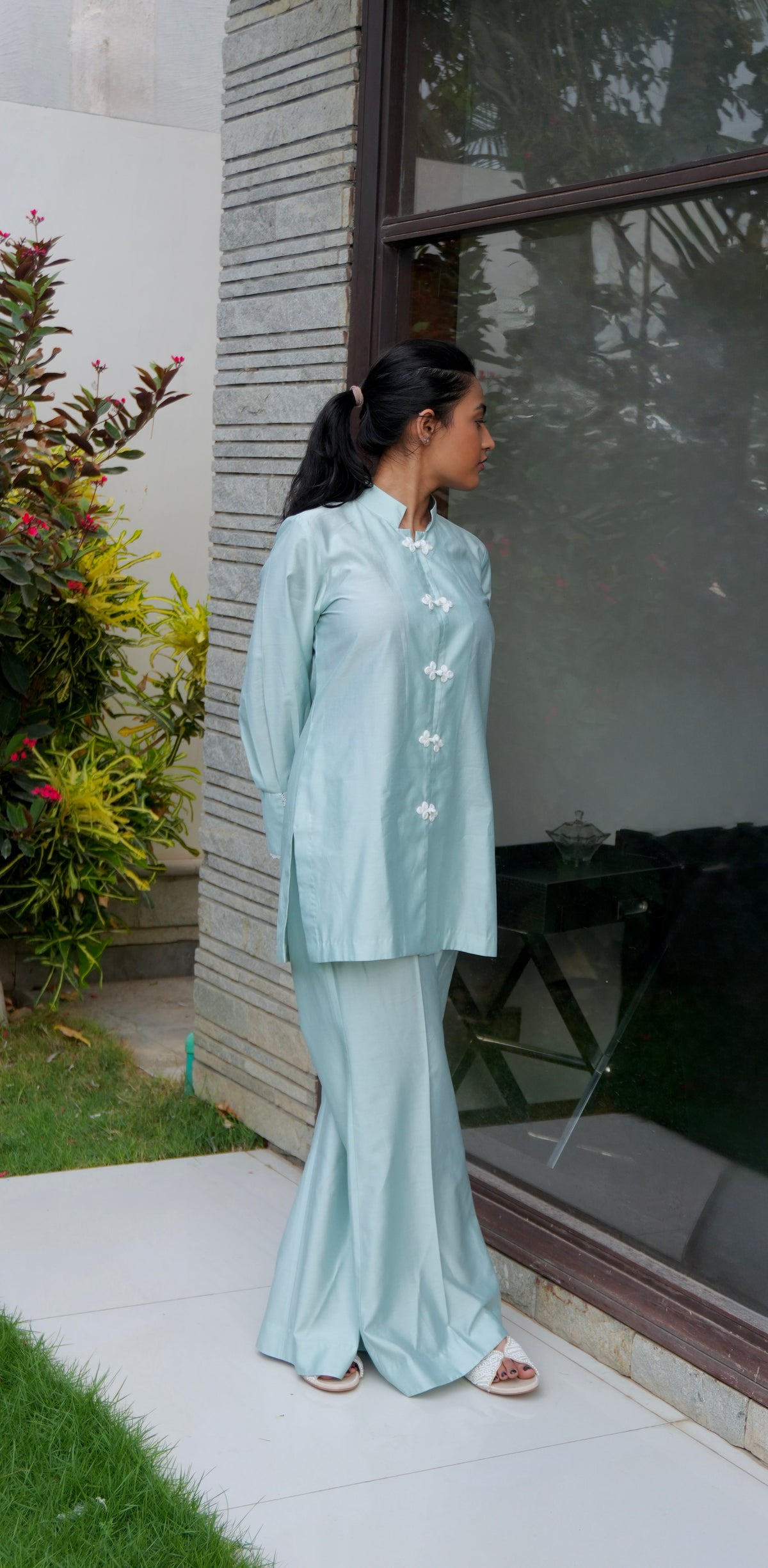 Alisho Soft Launch light blue green long sleeve shirt and bootcut pants side view